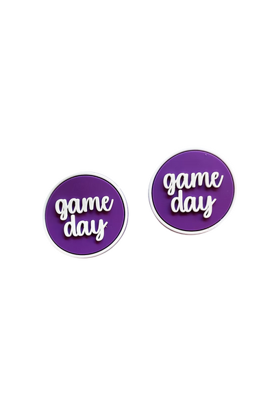 Pair of purple 'game day' boot buttons with white script lettering and border - perfect for spirited fans and tailgate style.