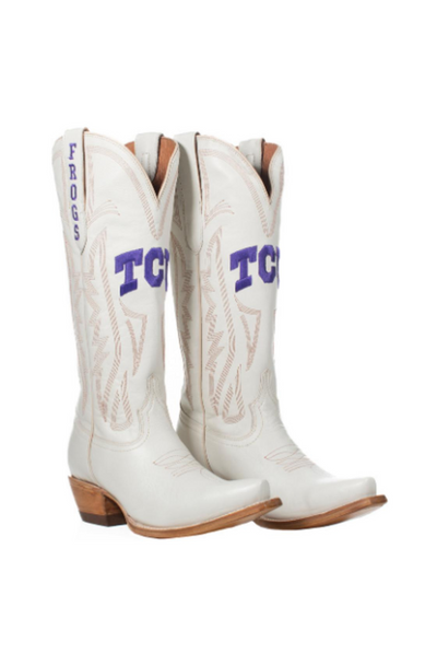 TCU Horned Frogs white leather cowboy boots with bold purple TCU lettering and "FROGS" embroidered on the pull tabs. Perfect for game day tailgates, college football fans, and Western-style outfits showing TCU team spirit.