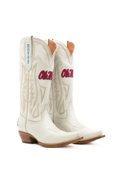 Ole Miss Rebels white leather cowboy boots featuring red and blue "Ole Miss" embroidery and "HOTTY" on the pull tabs. Ideal for college football fans, game day outfits, and showing team pride with a classic Western flair.
