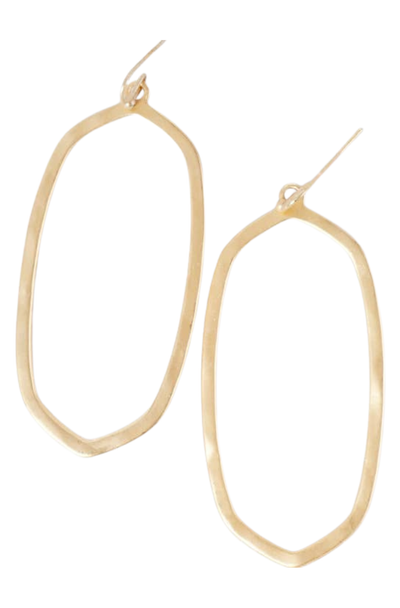 Gold hammered oval hoop earrings on a white background