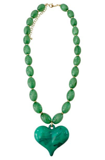 Green beaded necklace with a heart-shaped pendant on a white background